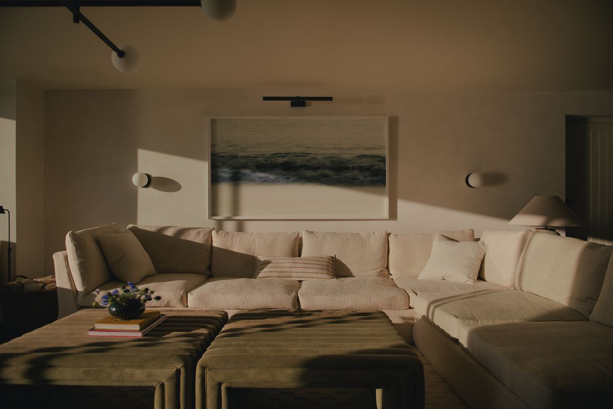 Deep sectional sofa facing the sea