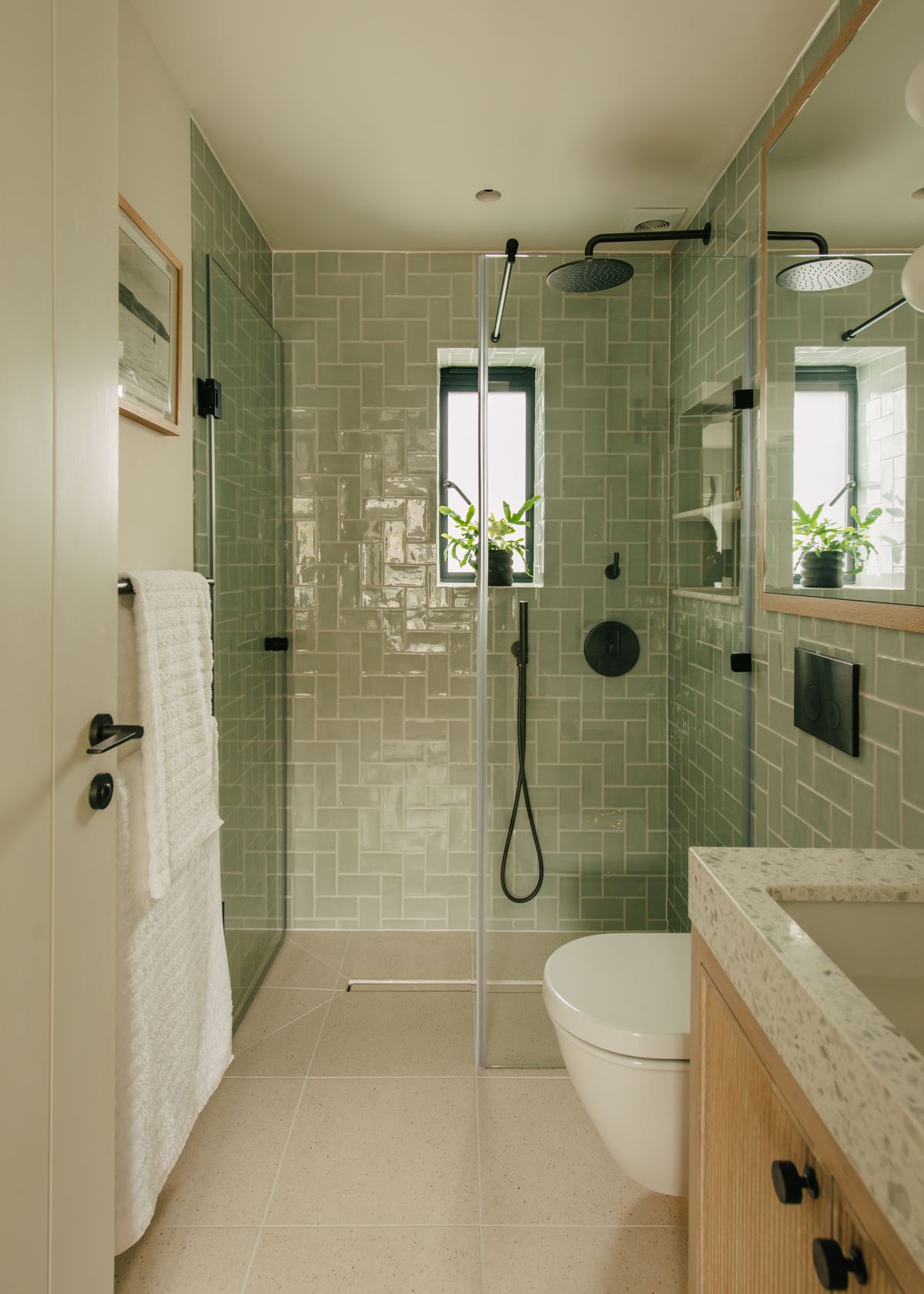 Green tiled shower room