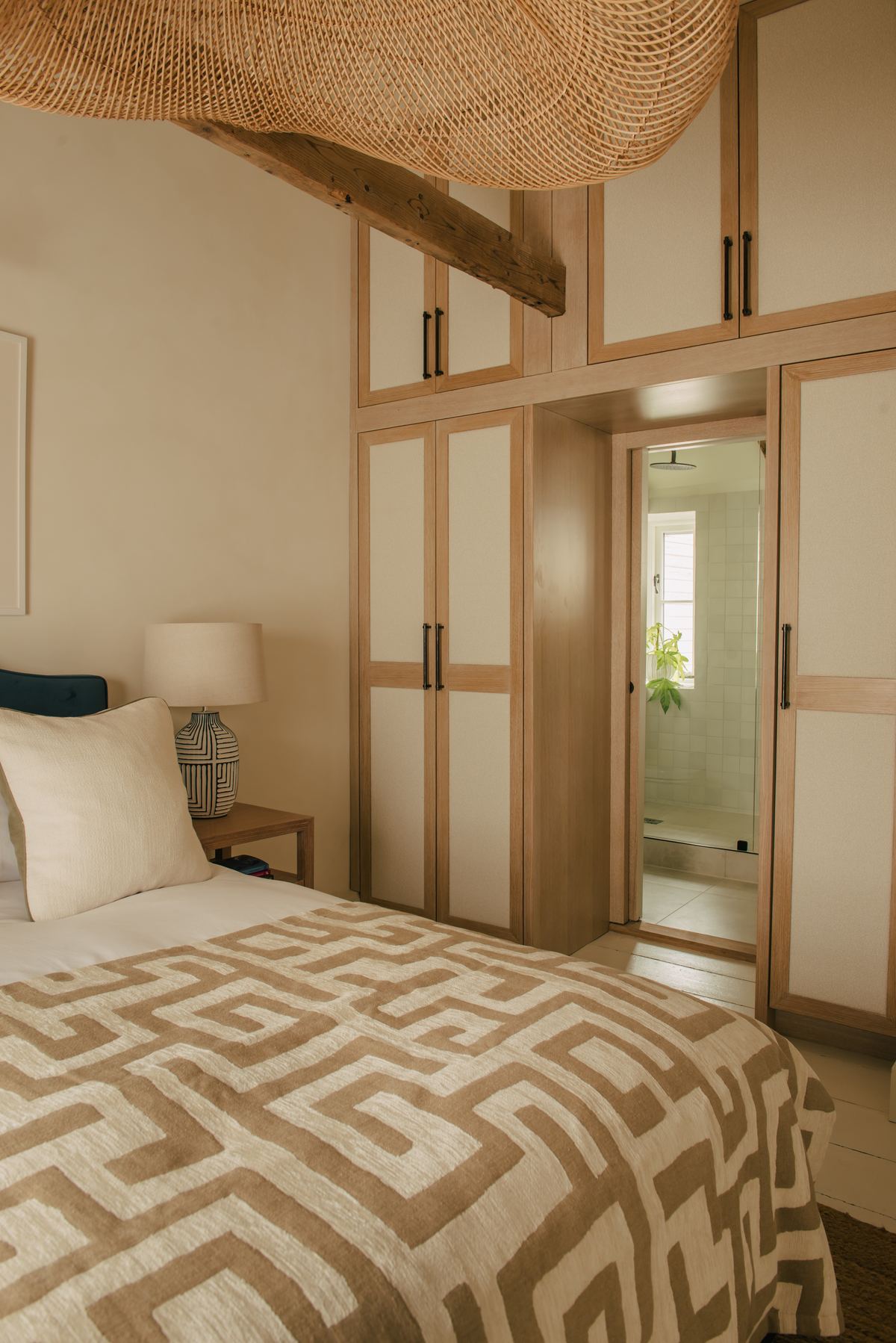 Bed with woven throw