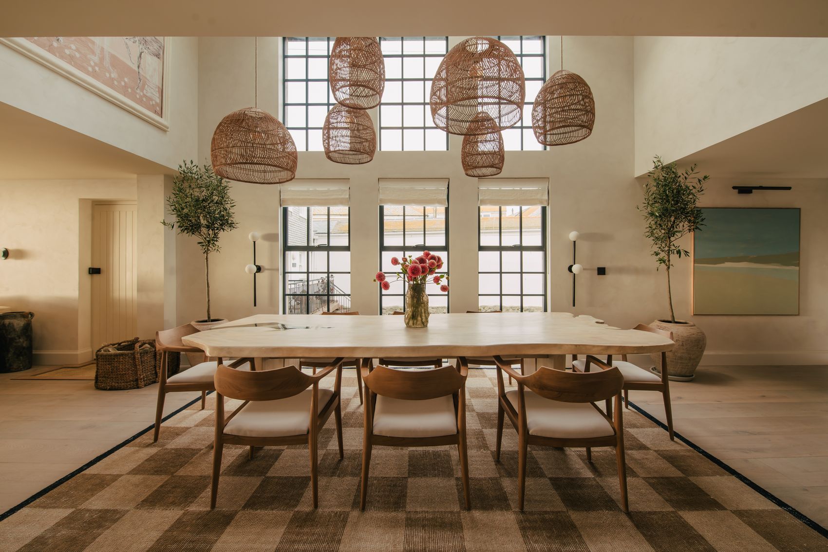 Dining room with woven pendants