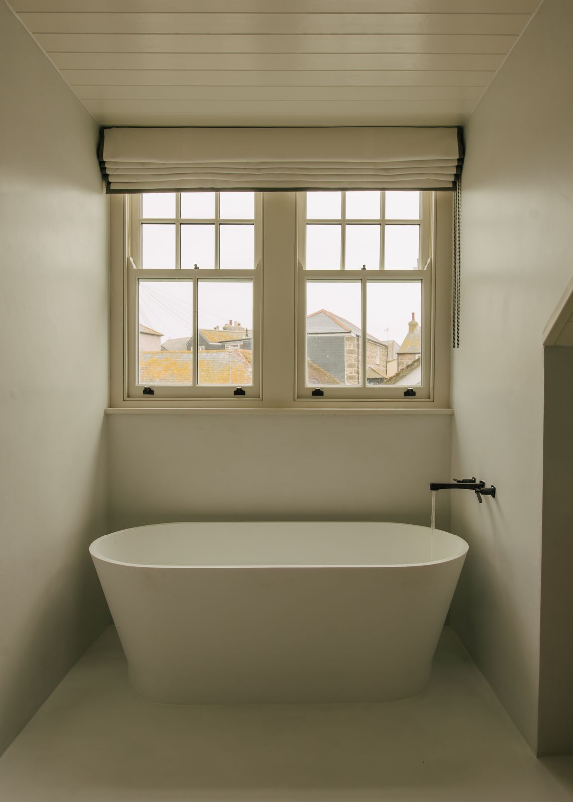 Bath beneath the windows