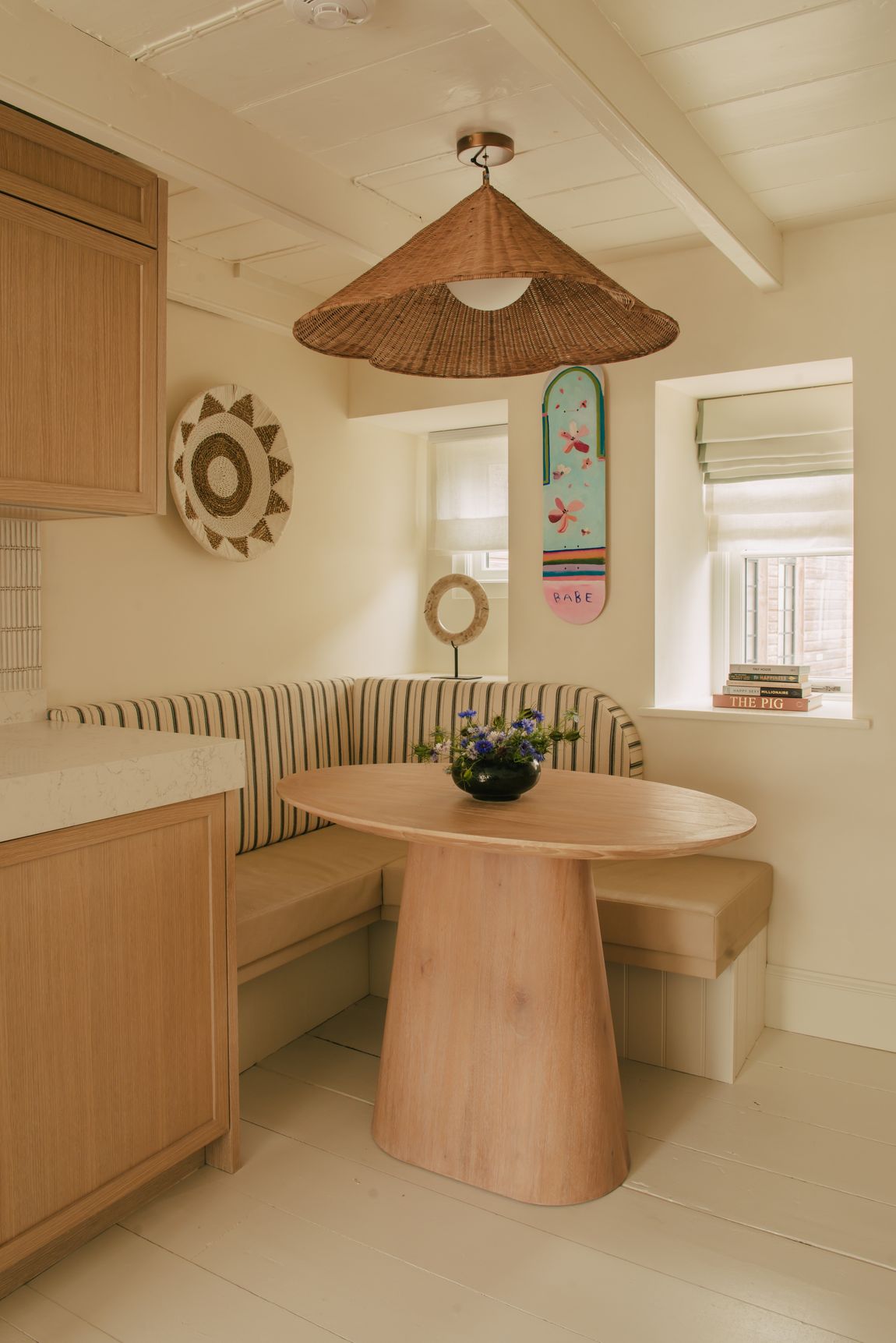 Curved banquette and dining table